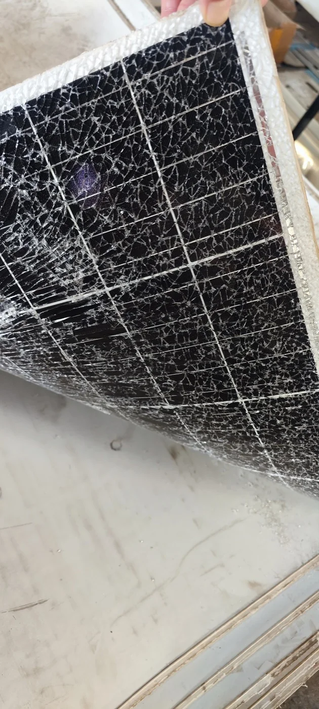 Shattered glass on a damaged solar panel